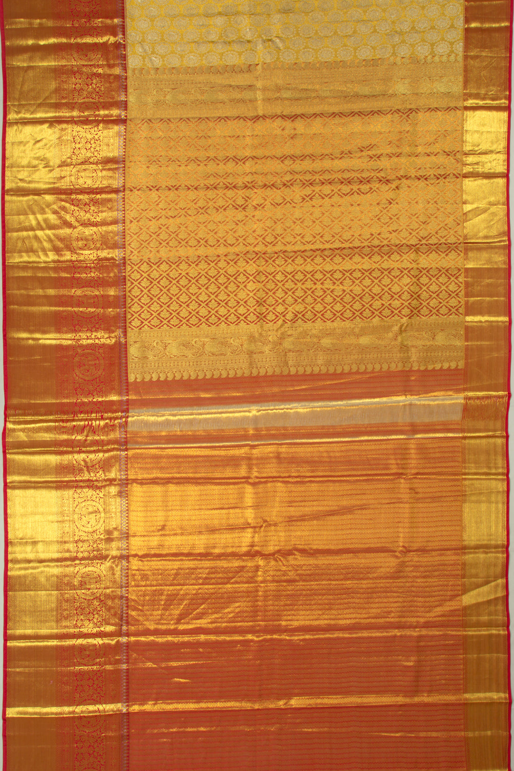Taranga Kanchi Silk Tissue Brocade Gold Saree