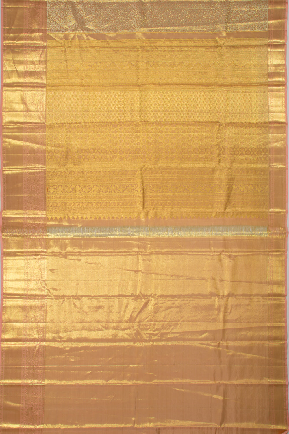 Taranga Kanchi Silk Tissue Brocade Peach Saree