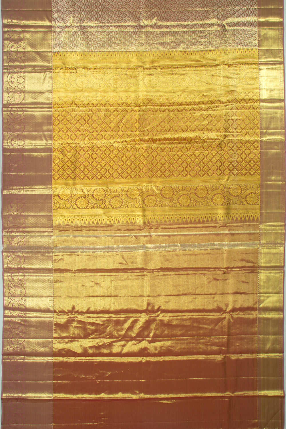 Taranga Kanchi Silk Tissue Brocade Gold Saree