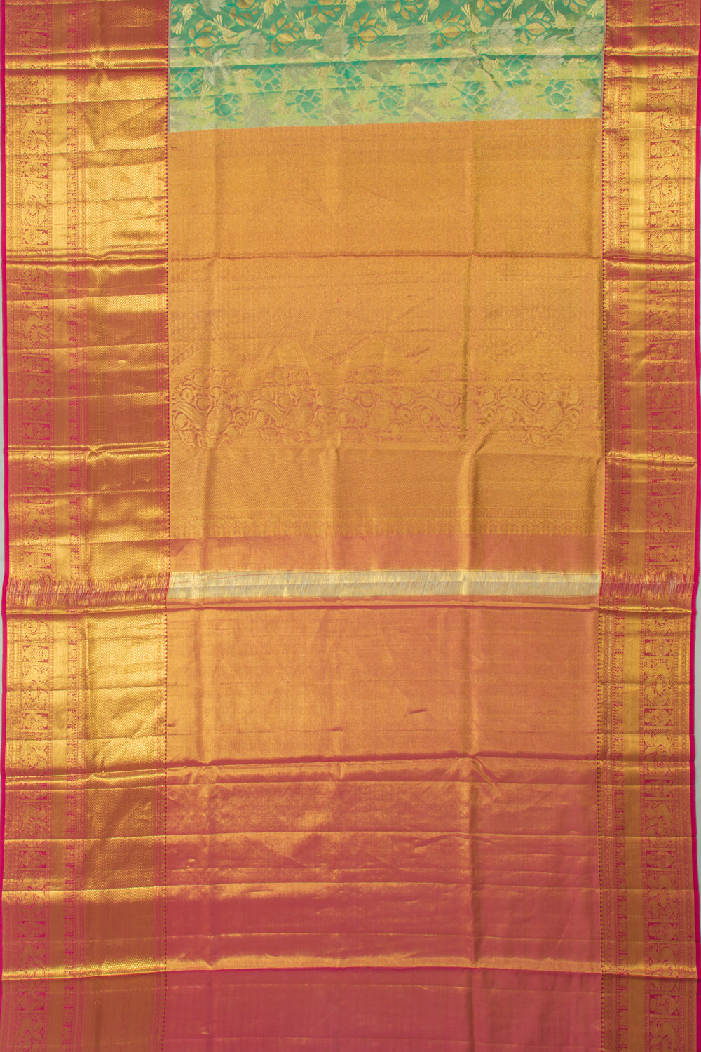 Taranga Kanchi Silk Tissue Brocade Green Saree