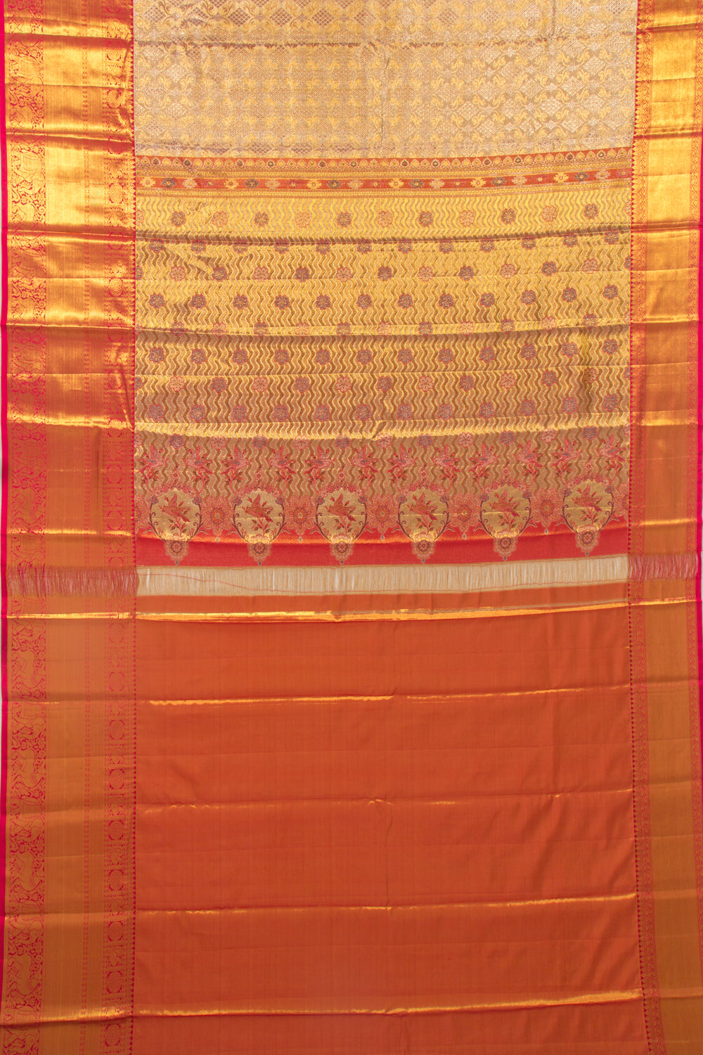 Taranga Kanchi Silk Tissue Brocade Gold Saree