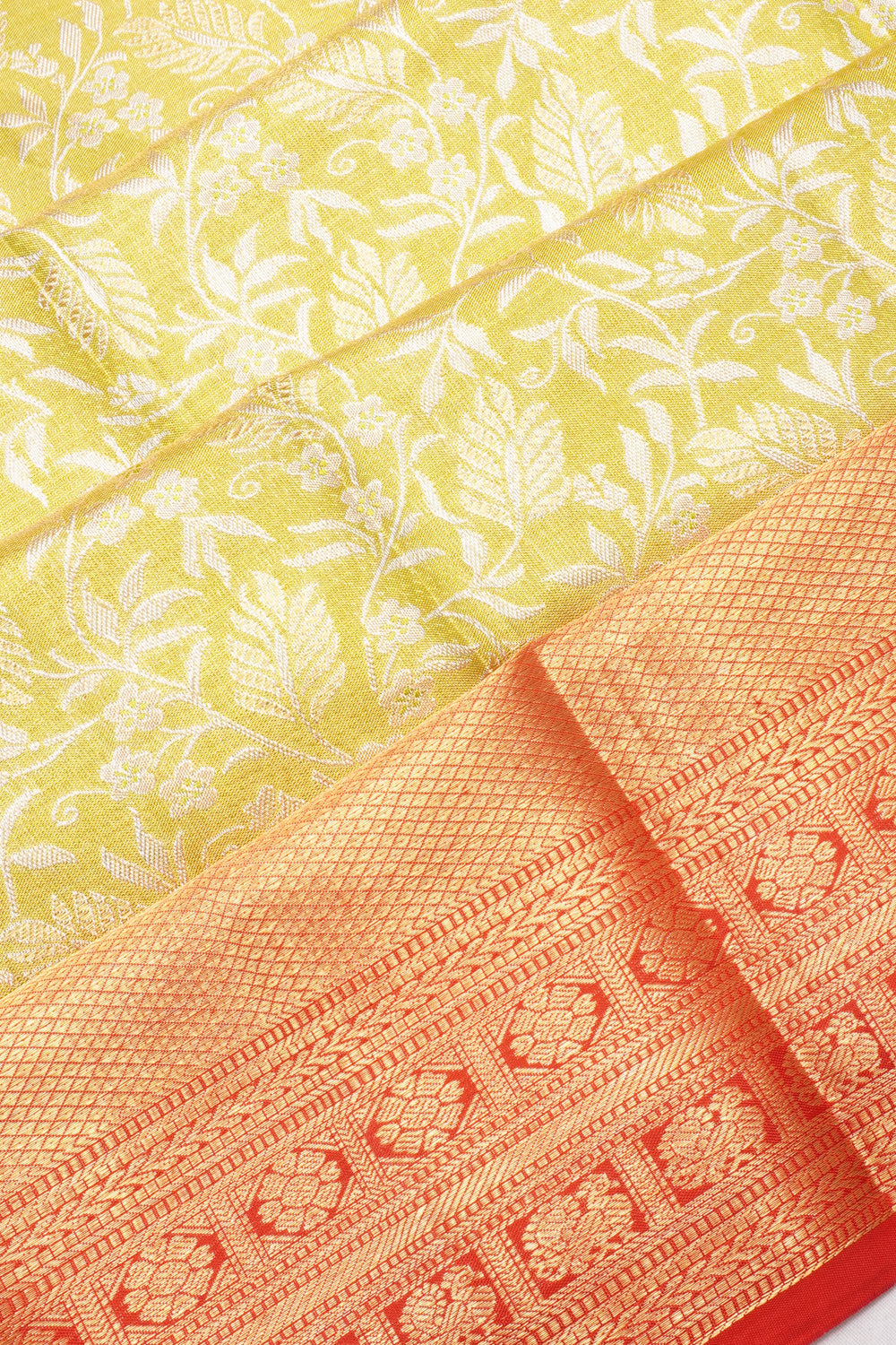 Taranga Kanchi Silk Tissue Brocade Green Saree