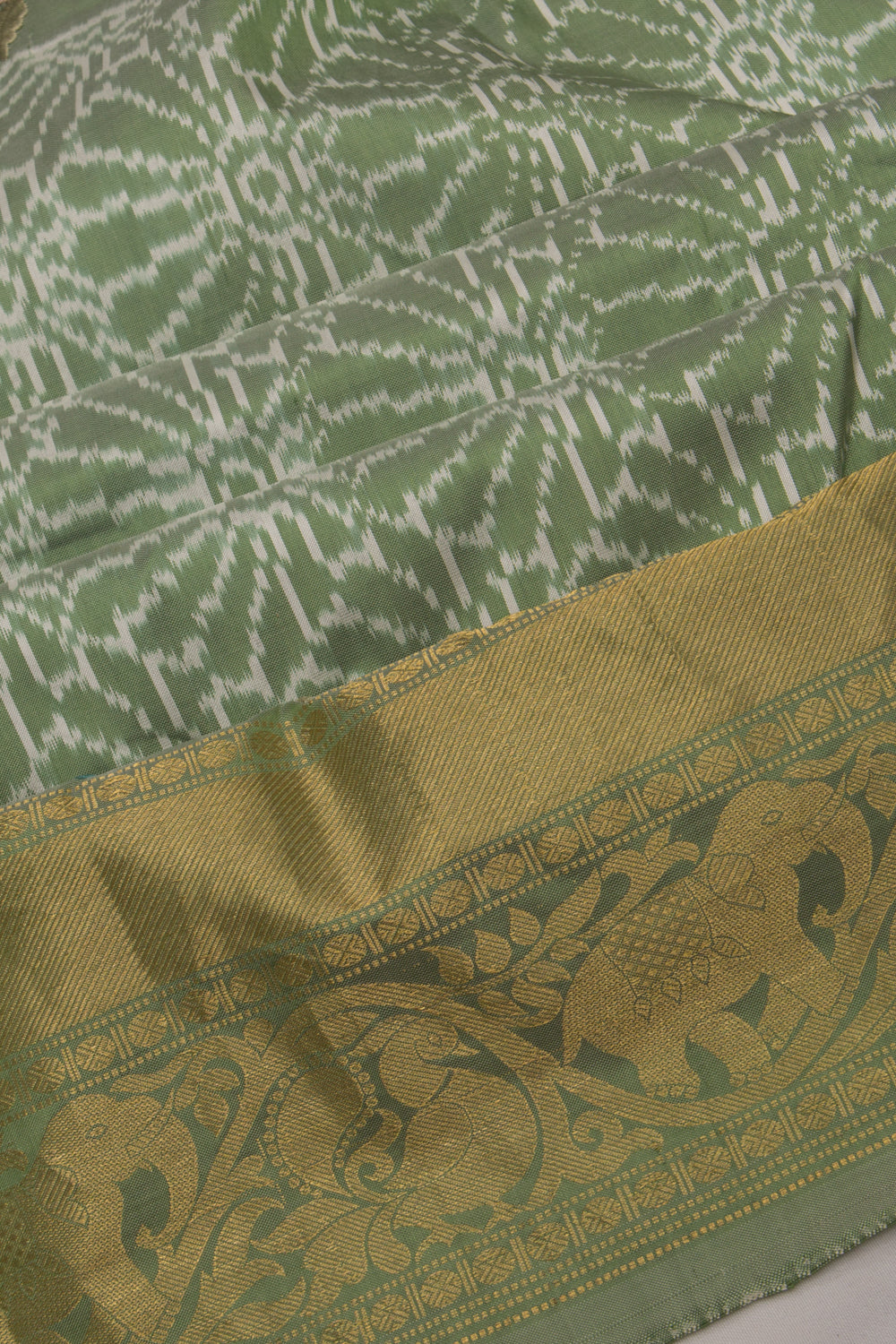 Kanchipuram Silk Ikat Pastel Green Saree With Embroidery Boarder