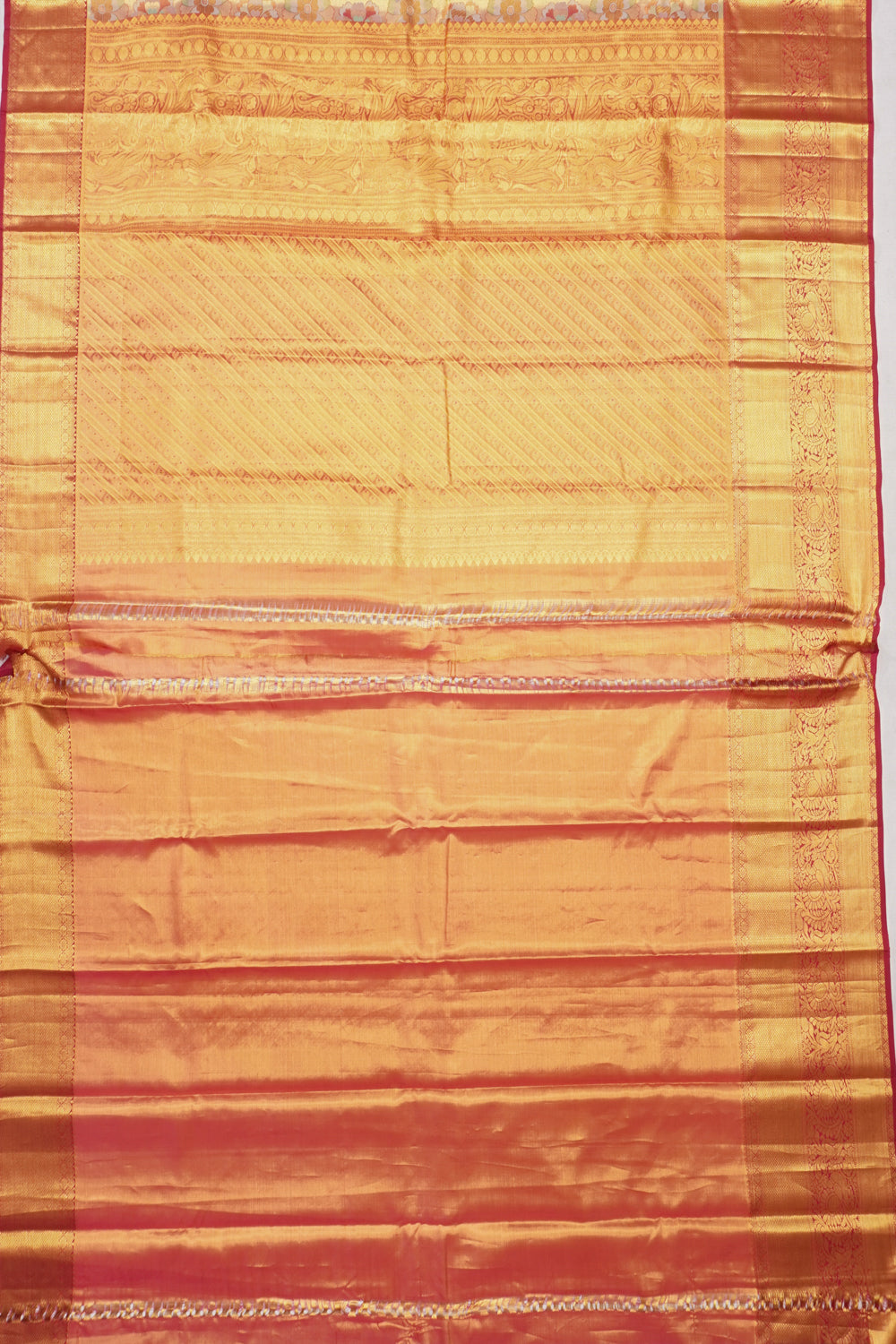 Taranga Kanchi Silk Tissue Brocade Gold Saree