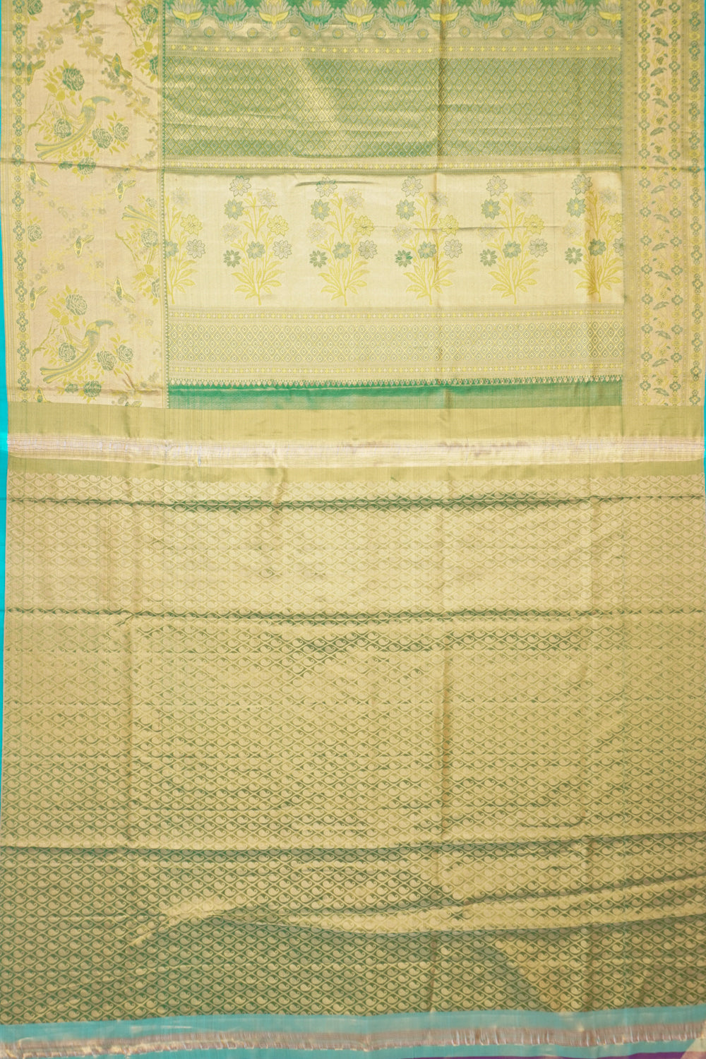 Taranga Kanchi Silk Tissue Brocade Gold Saree