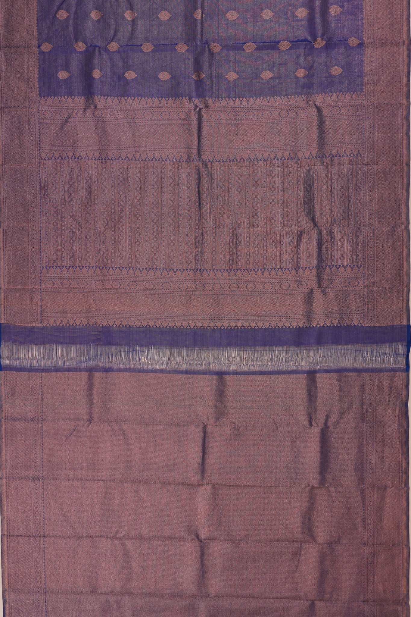 Taranga Kanchi Silk Tissue Oosi Lines And Butta Blue Saree