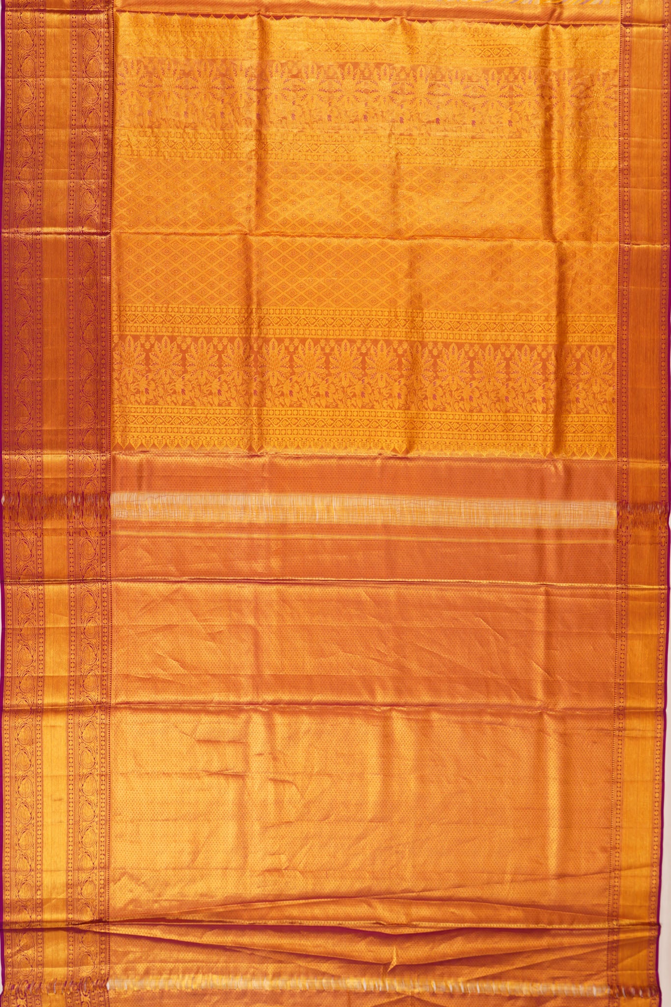 Taranga Kanchi Silk Tissue Brocade Gold Saree