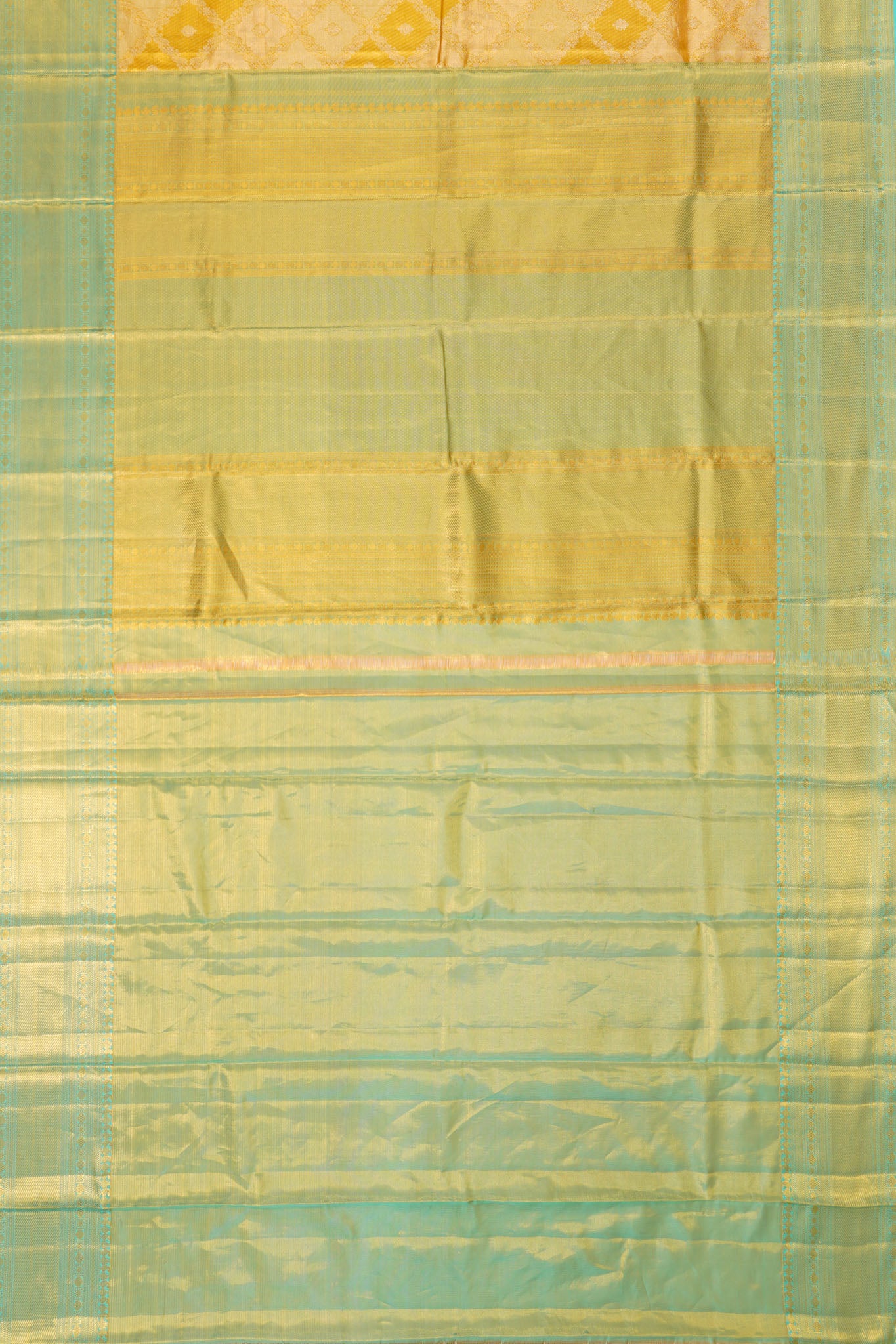 Taranga Kanchi Silk Tissue Brocade Gold Saree