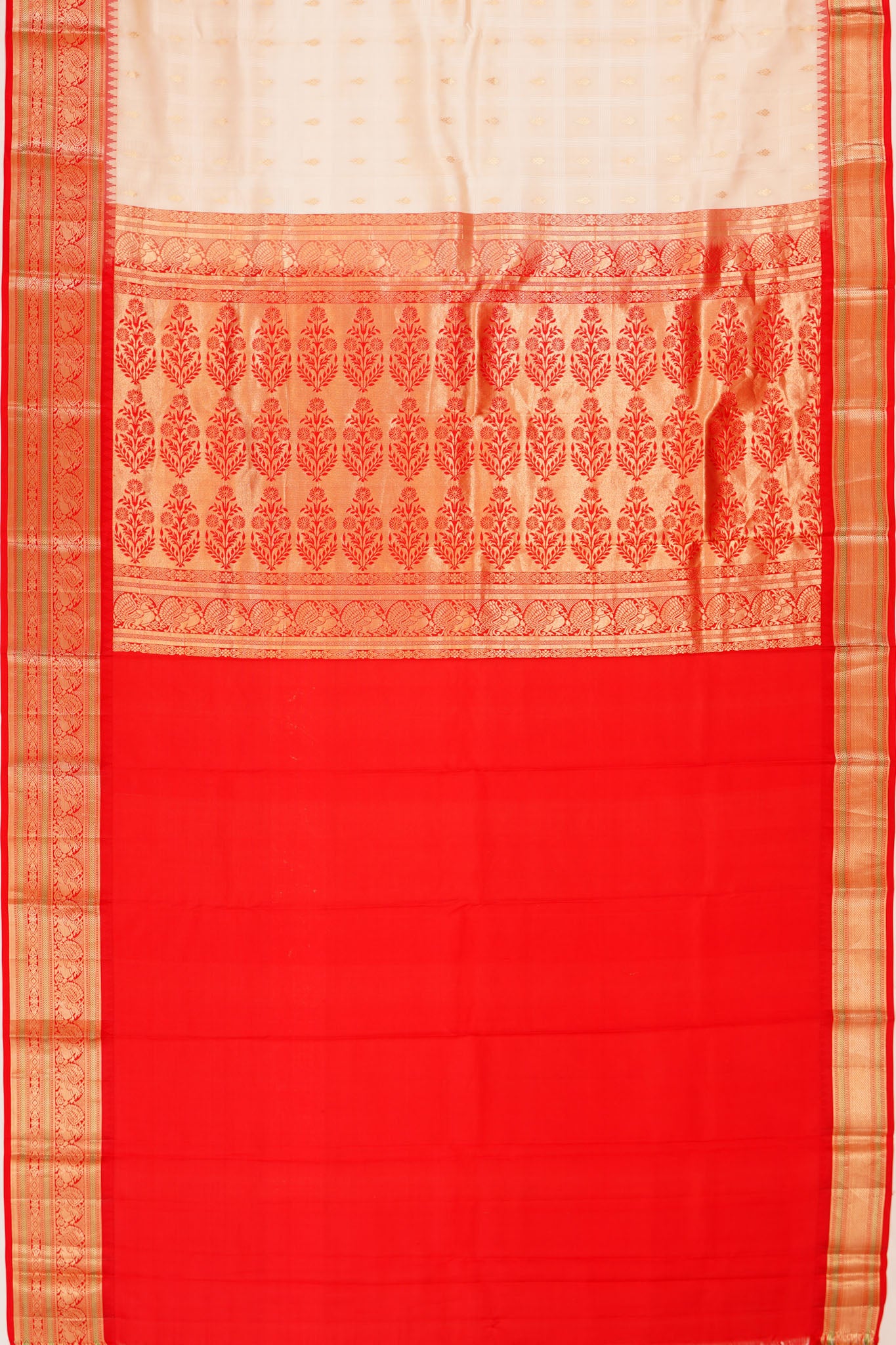 Taranga Kanchi Silk Checks And Butta Off White Saree