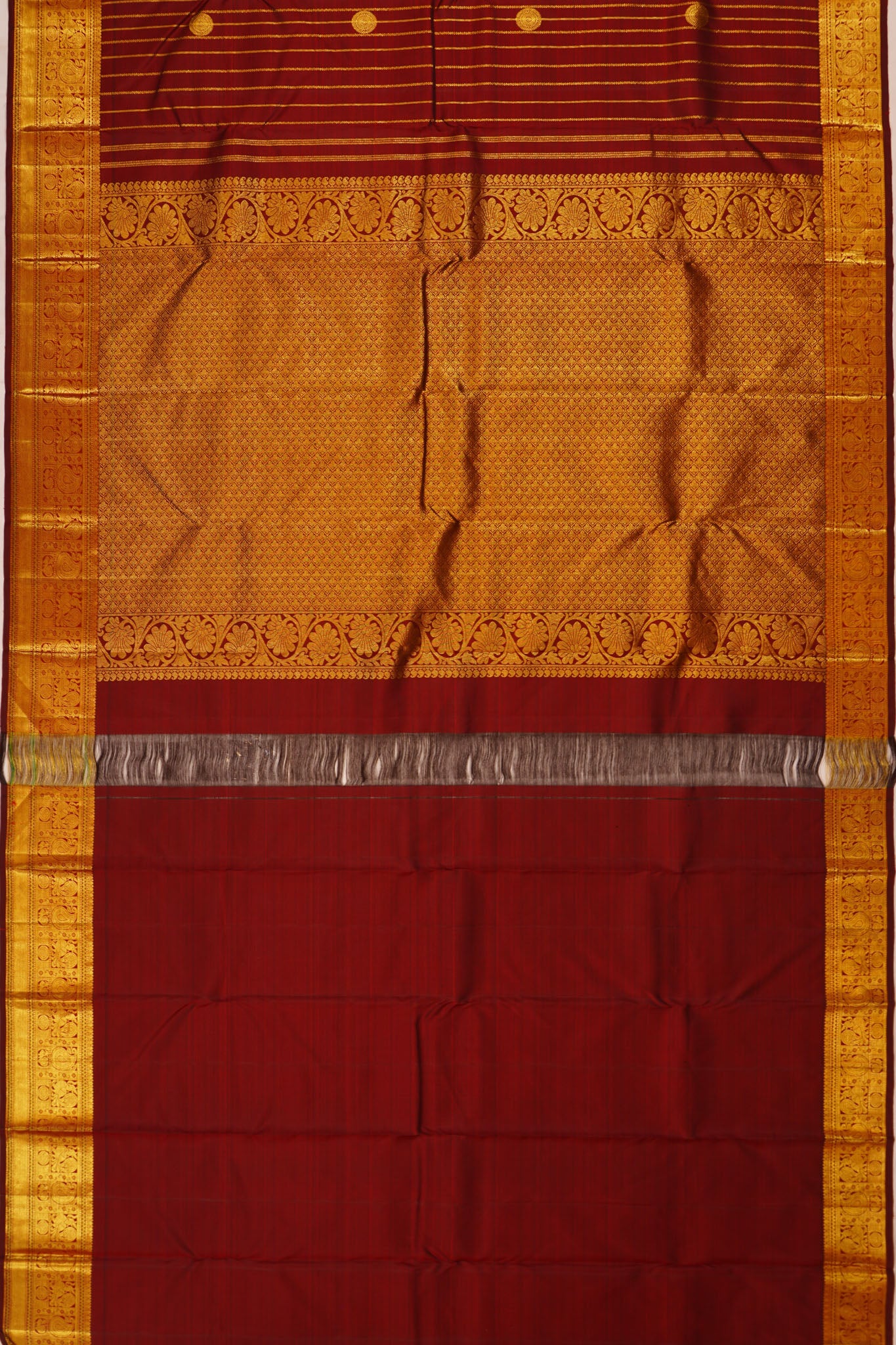 Taranga Kanchi Silk Vertical Iines And Butta Brown Saree