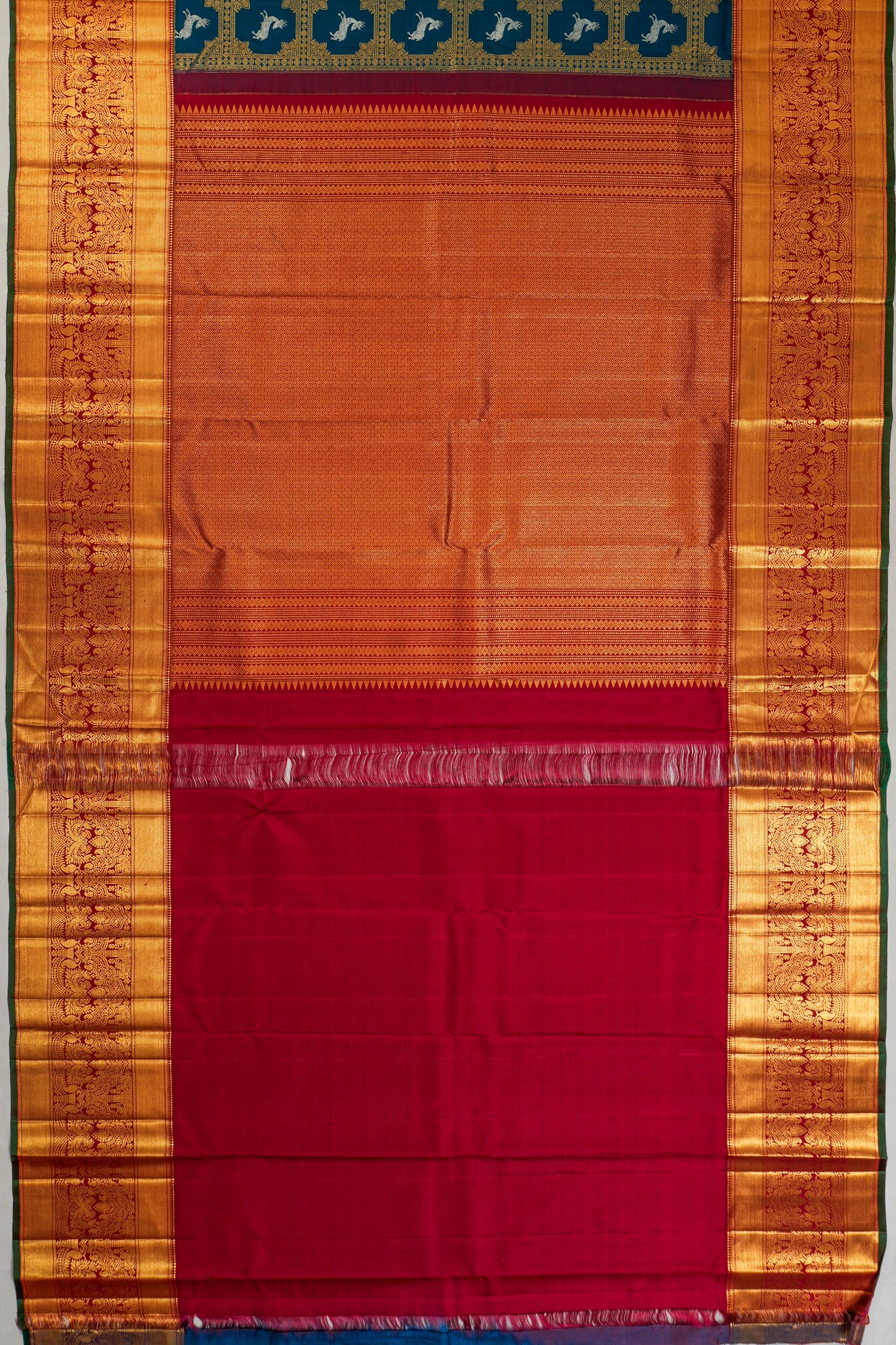 Kanchipuram Silk Brocade And Butta Teal Blue Saree