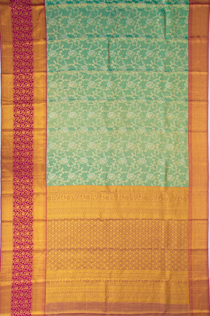 Taranga Kanchi Silk Tissue Jaal Green Saree