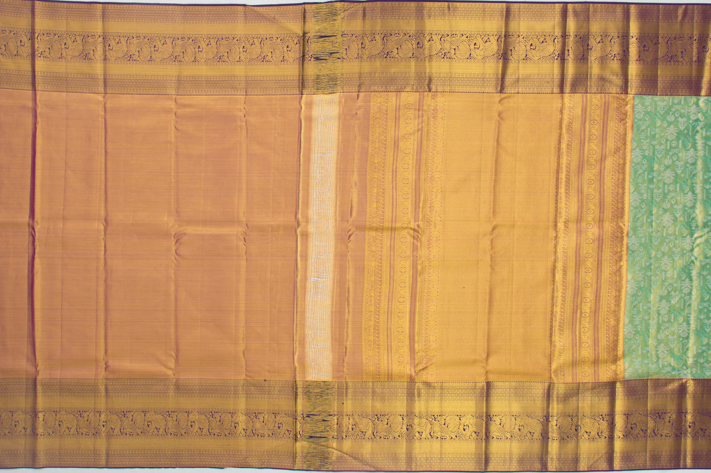 Taranga Kanchi Silk Tissue Brocade Green Sraee