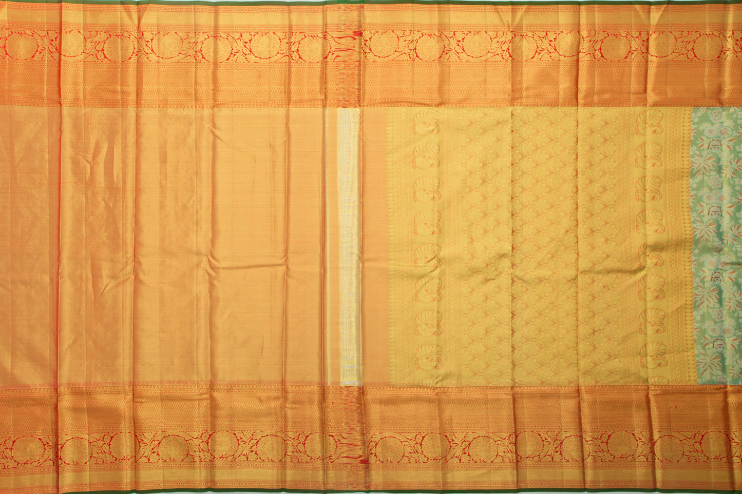 Taranga Kanchi Silk Tissue Brocade Green Saree