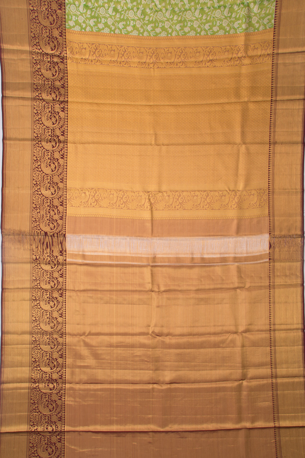 Taranga Kanchi Silk Tissue Jaal Green Saree