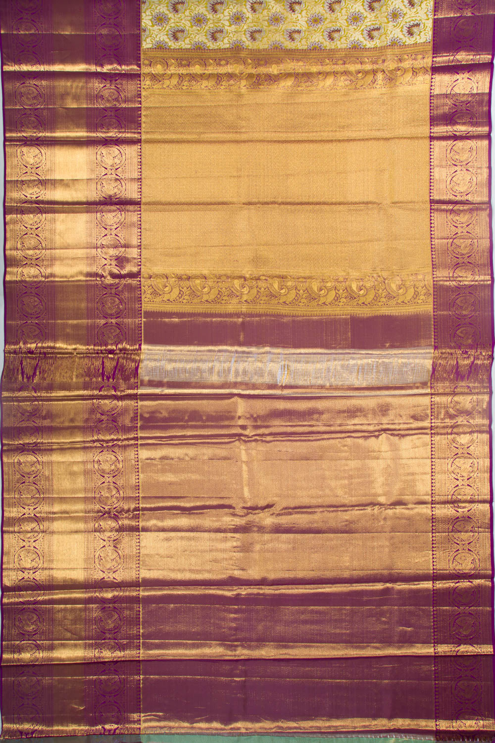 Taranga Kanchi Silk Tissue Jaal Green Saree