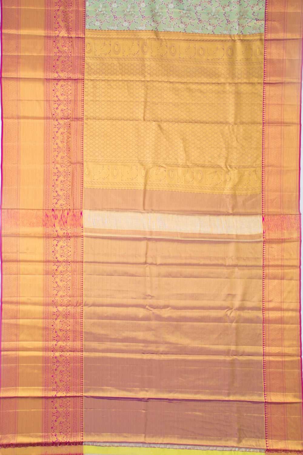Taranga Kanchi Silk Tissue Jaal and Butta Green Saree
