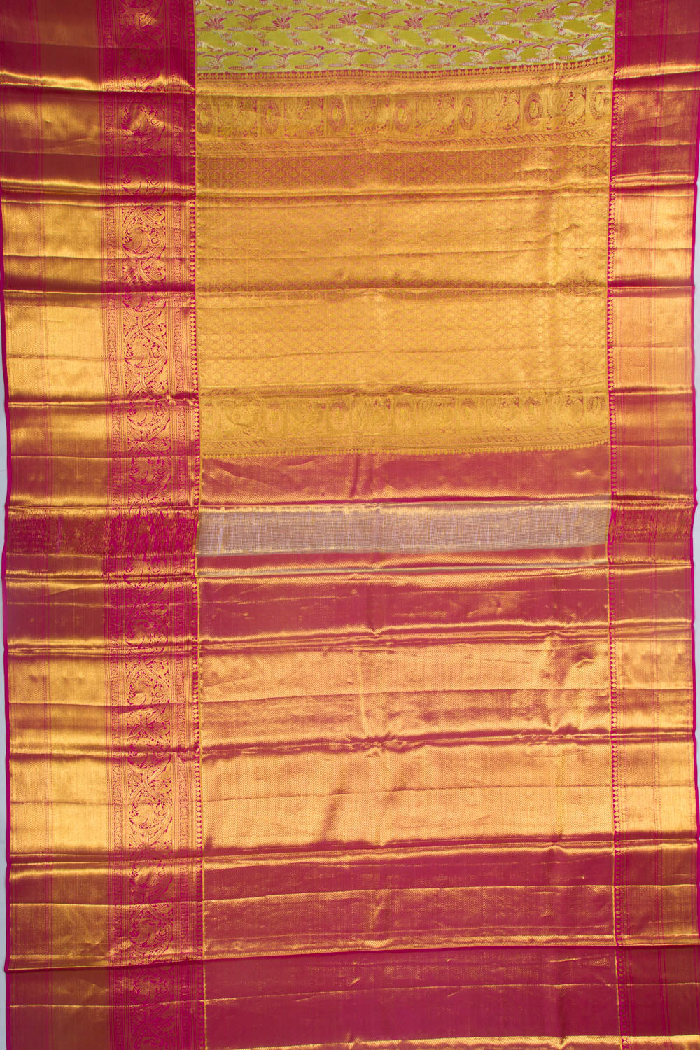 Taranga Kanchi Silk Tissue Brocade Green Saree