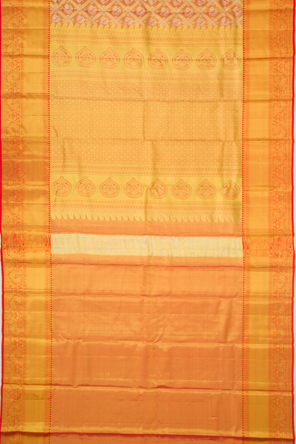 Taranga Kanchi Silk Tissue Criss Cross Checks And Butta Orange Saree