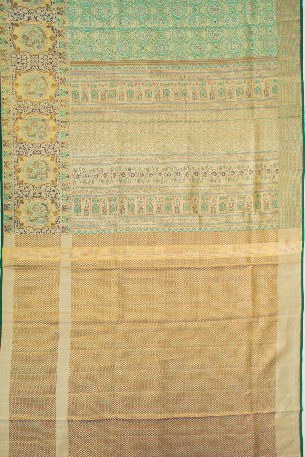 Taranga Kanchi Silk Tissue Brocade Green Saree