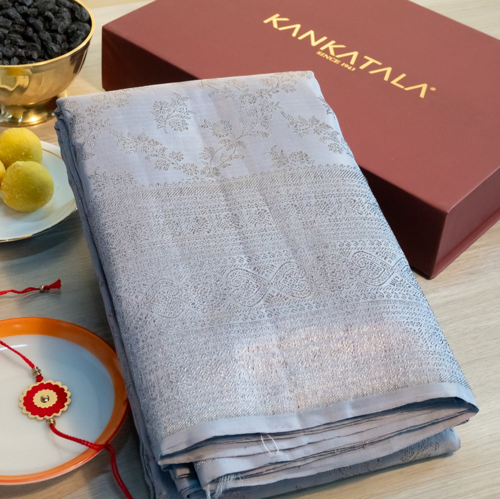 Kanchipuram Silk Antique Zari Jaal And Butta Powder Blue Saree With Gift Box And Rakhi