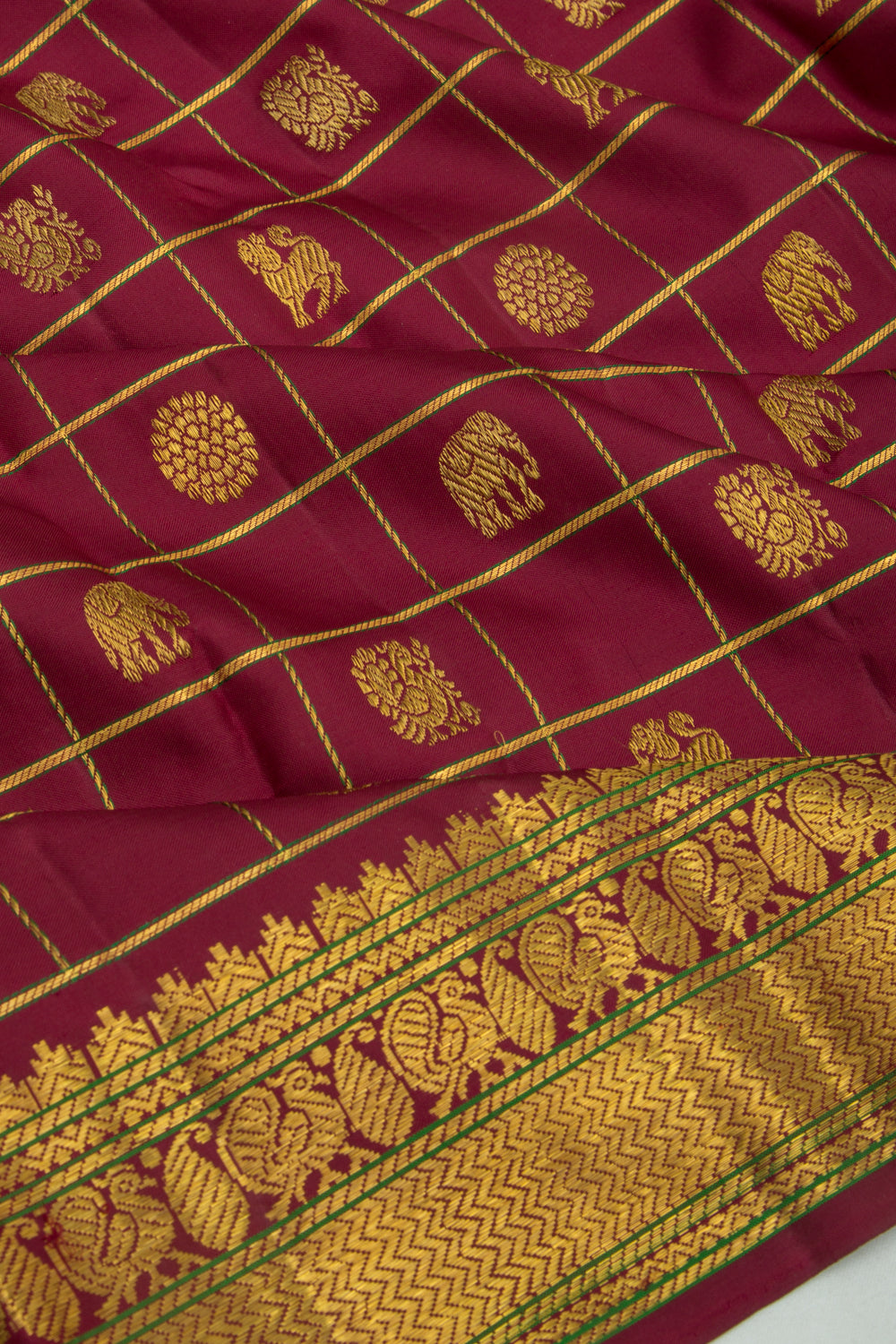 Kanchipuram Silk Checks And Butta Maroon Saree