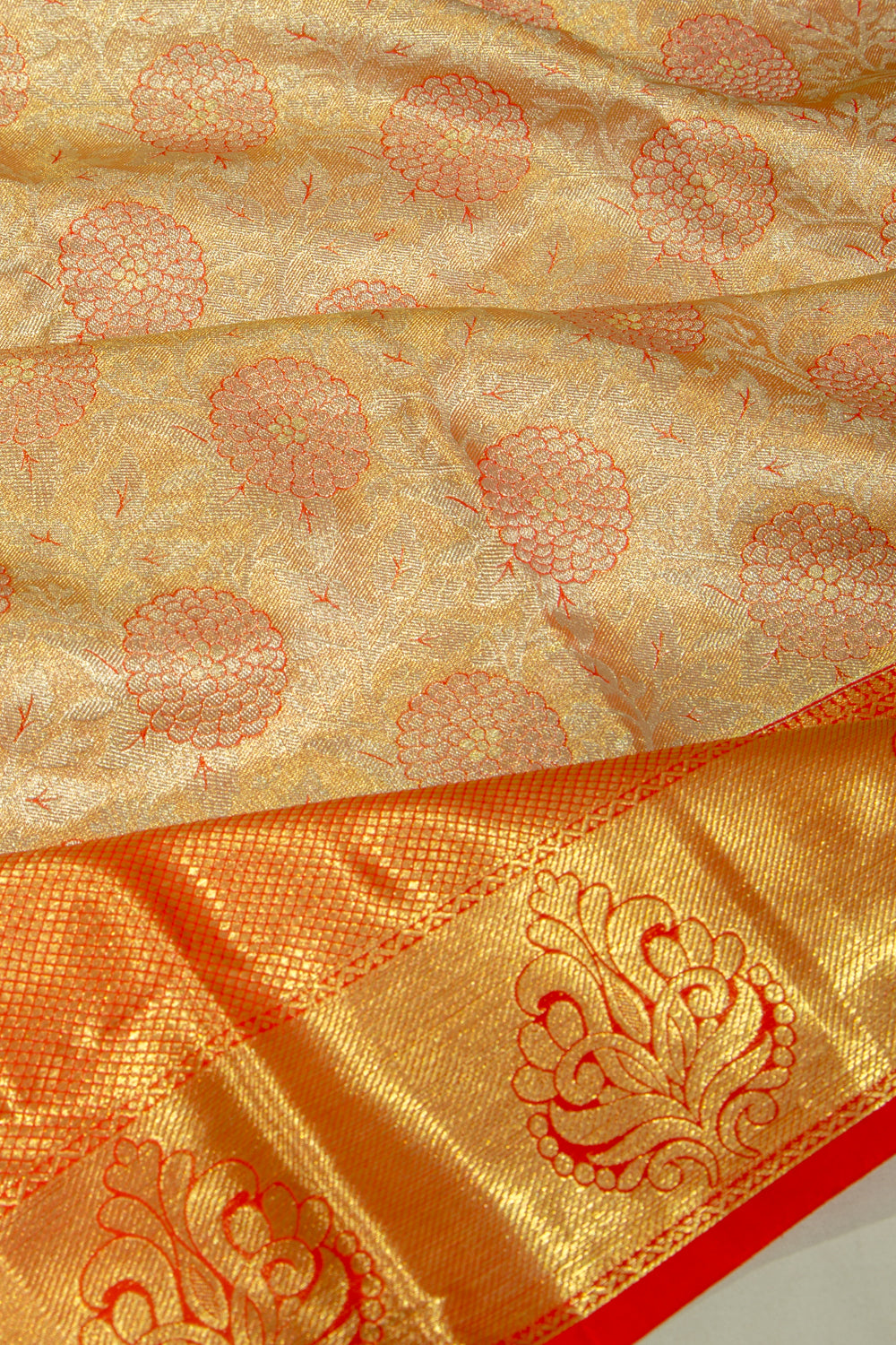Taranga Kanchi Silk Tissue Jaal Orange Saree