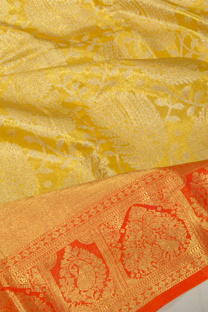 Taranga Kanchi Silk Tissue Jaal Yellow Saree