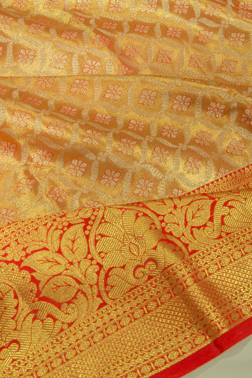 Taranga Kanchi Silk Tissue Brocade Orange Saree