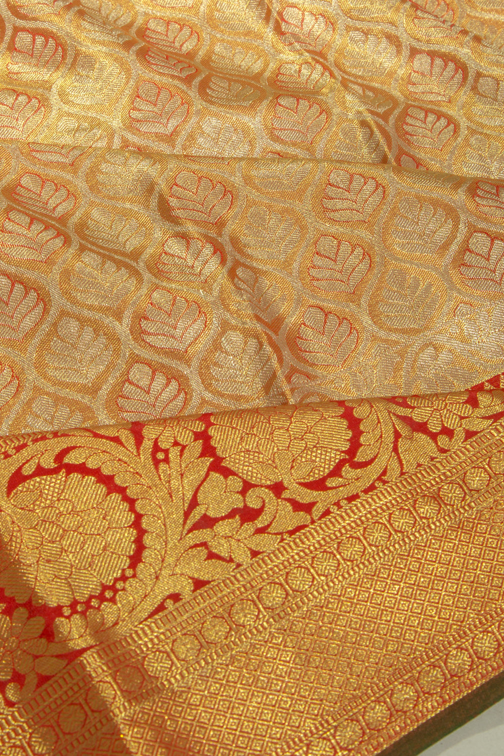 Taranga Kanchi Silk Tissue Brocade Orange Saree