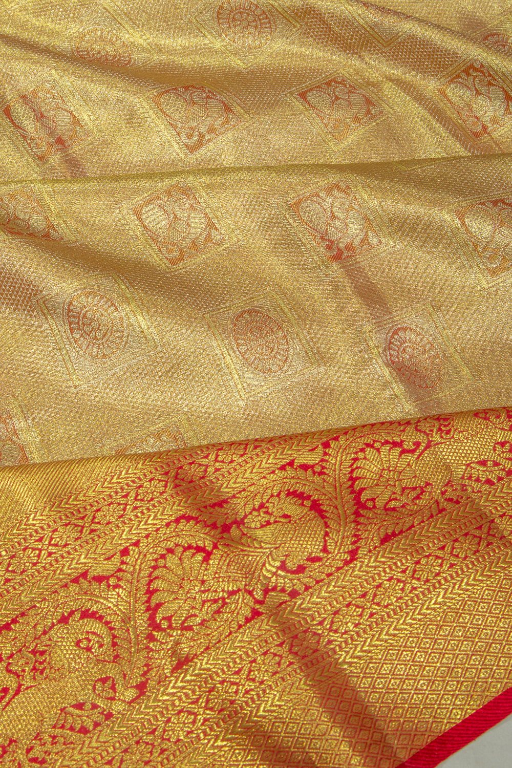 Taranga Kanchi Silk Tissue Brocade Orange Saree