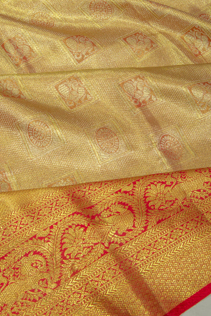 Taranga Kanchi Silk Tissue Brocade Orange Saree