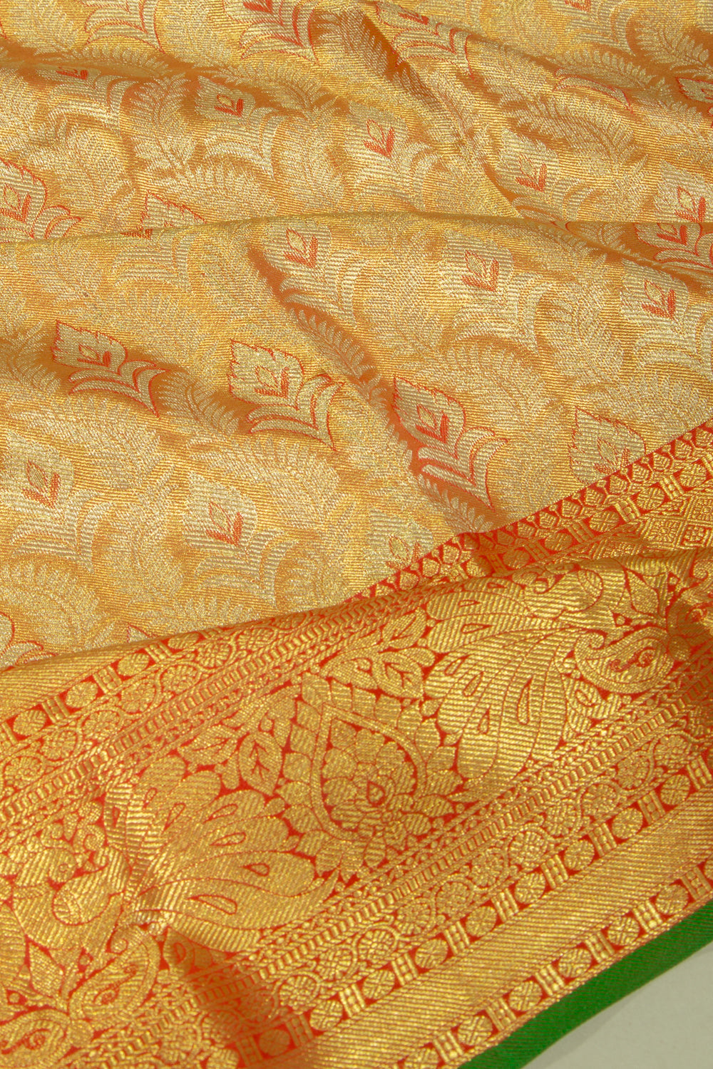 Taranga Kanchi Silk Tissue Brocade Gold Saree