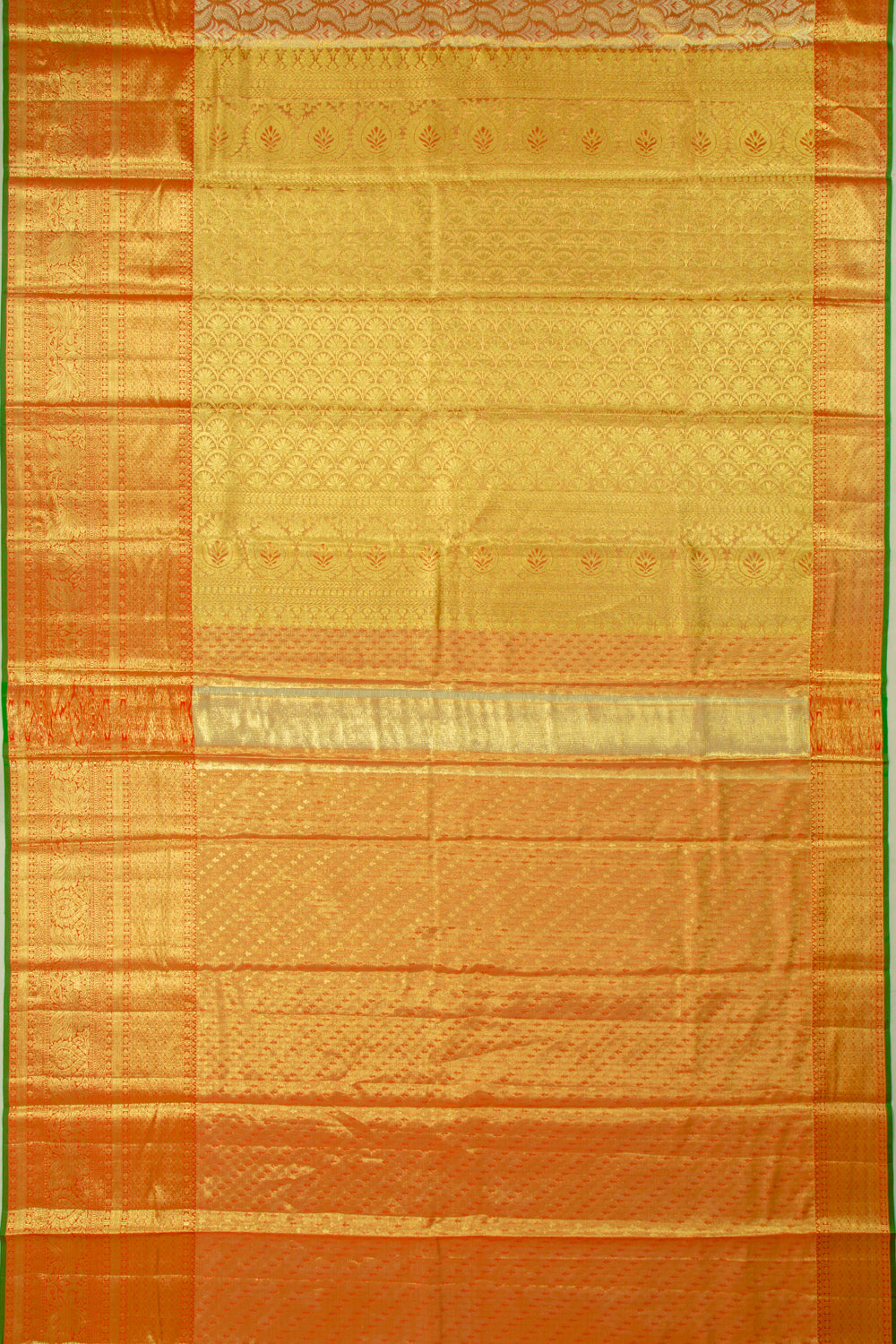 Taranga Kanchi Silk Tissue Brocade Gold Saree