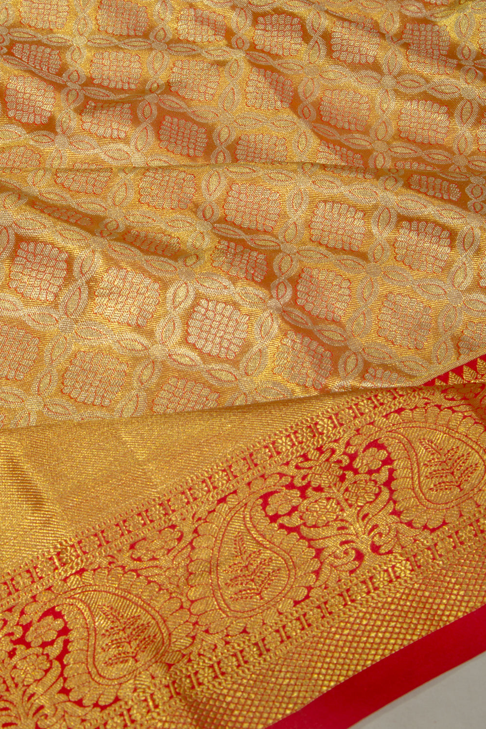 Taranga Kanchi Silk Tissue Brocade Gold Saree