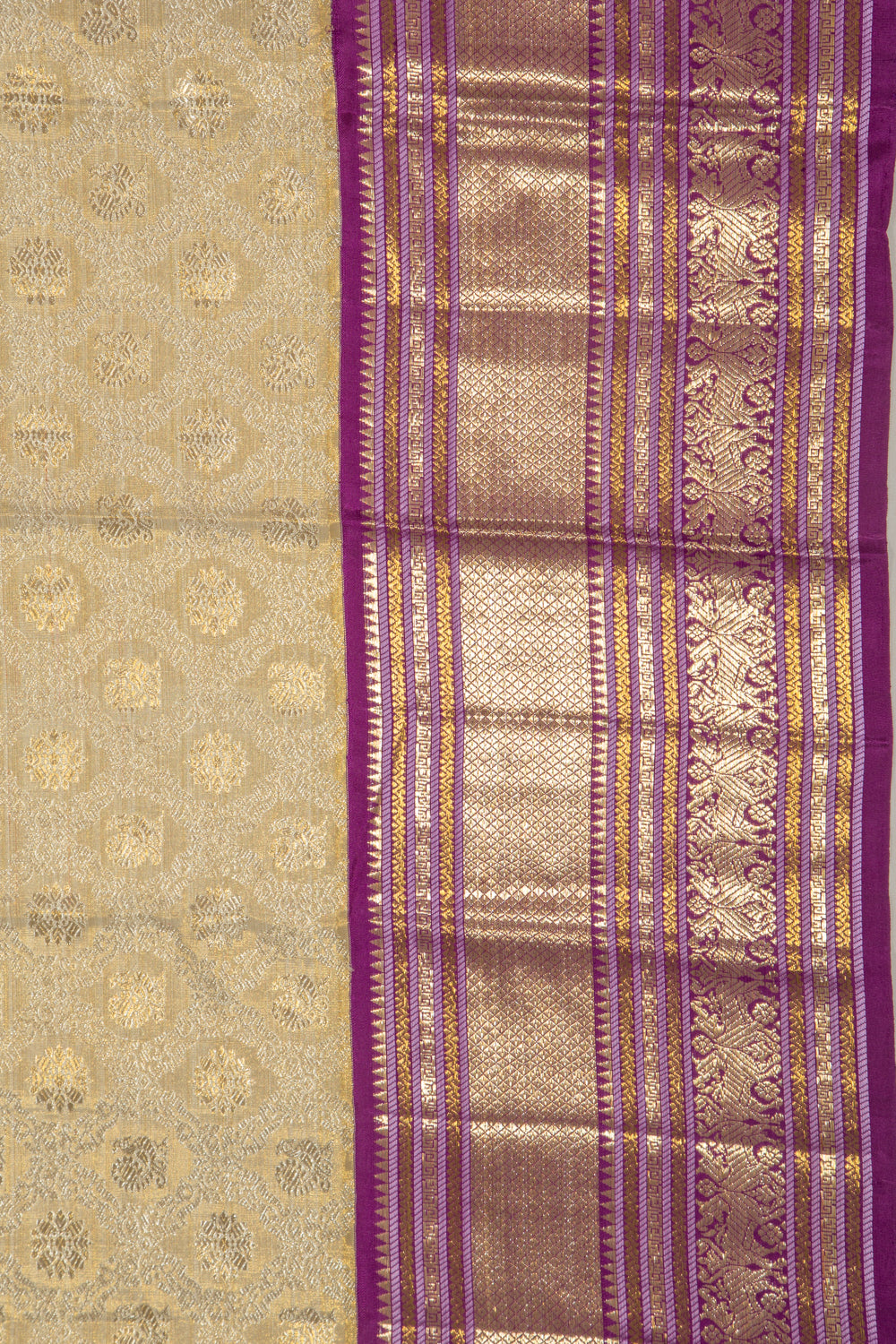 Kanchipuram Silk Tissue Jaal And Butta Cream Saree