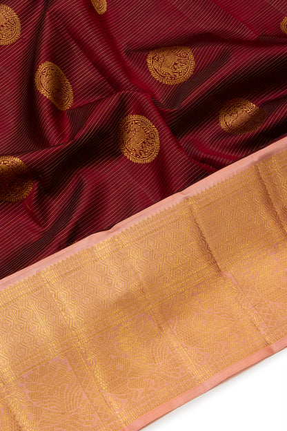Kanchipuram Silk Oosi Lines And Butta Maroon Saree