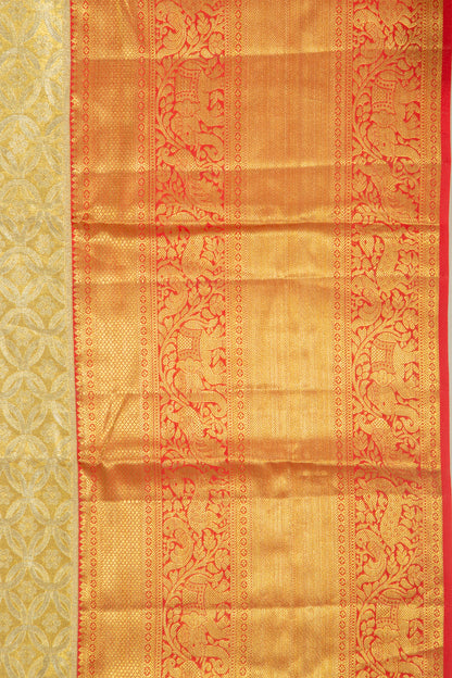 Taranga Kanchi Silk Tissue Brocade Gold Saree
