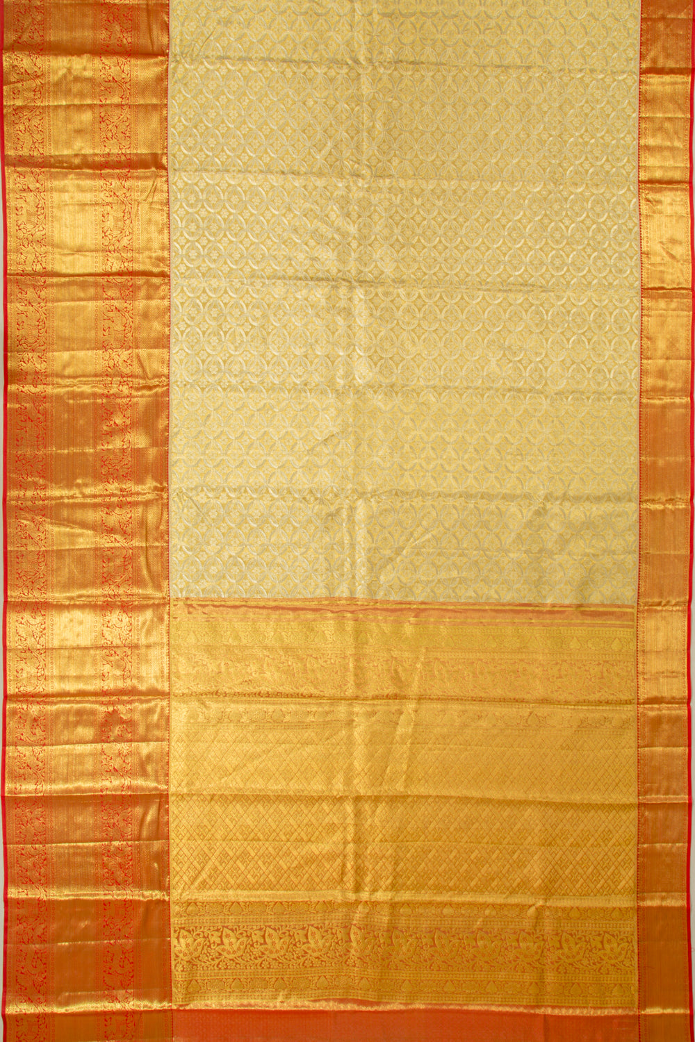 Taranga Kanchi Silk Tissue Brocade Gold Saree