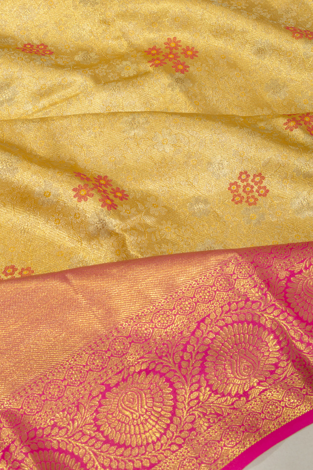 Taranga Kanchi Silk Tissue Brocade Gold Saree