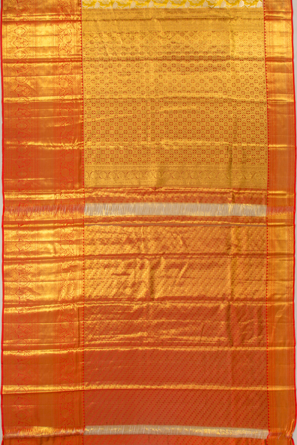 Taranga Kanchi Silk Tissue Jaal Gold Saree