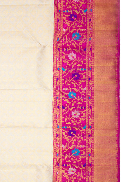 Kanchipuram Silk Jaal And Butta Cream Saree