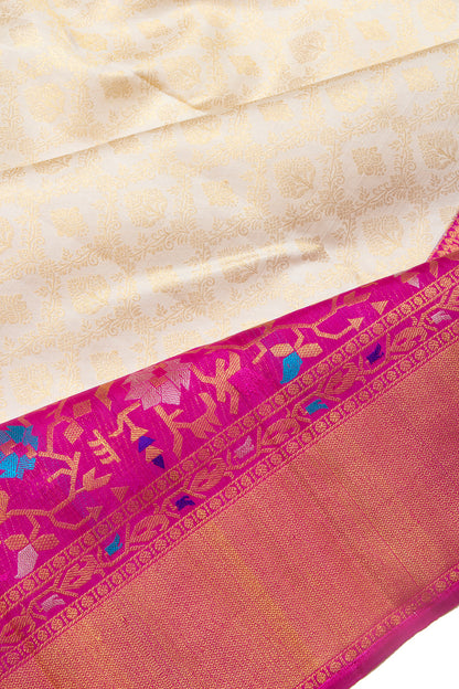Kanchipuram Silk Jaal And Butta Cream Saree
