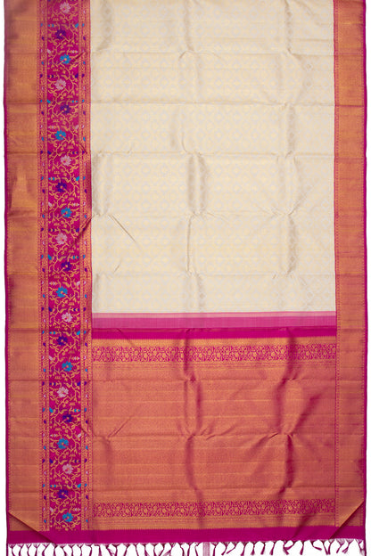Kanchipuram Silk Jaal And Butta Cream Saree