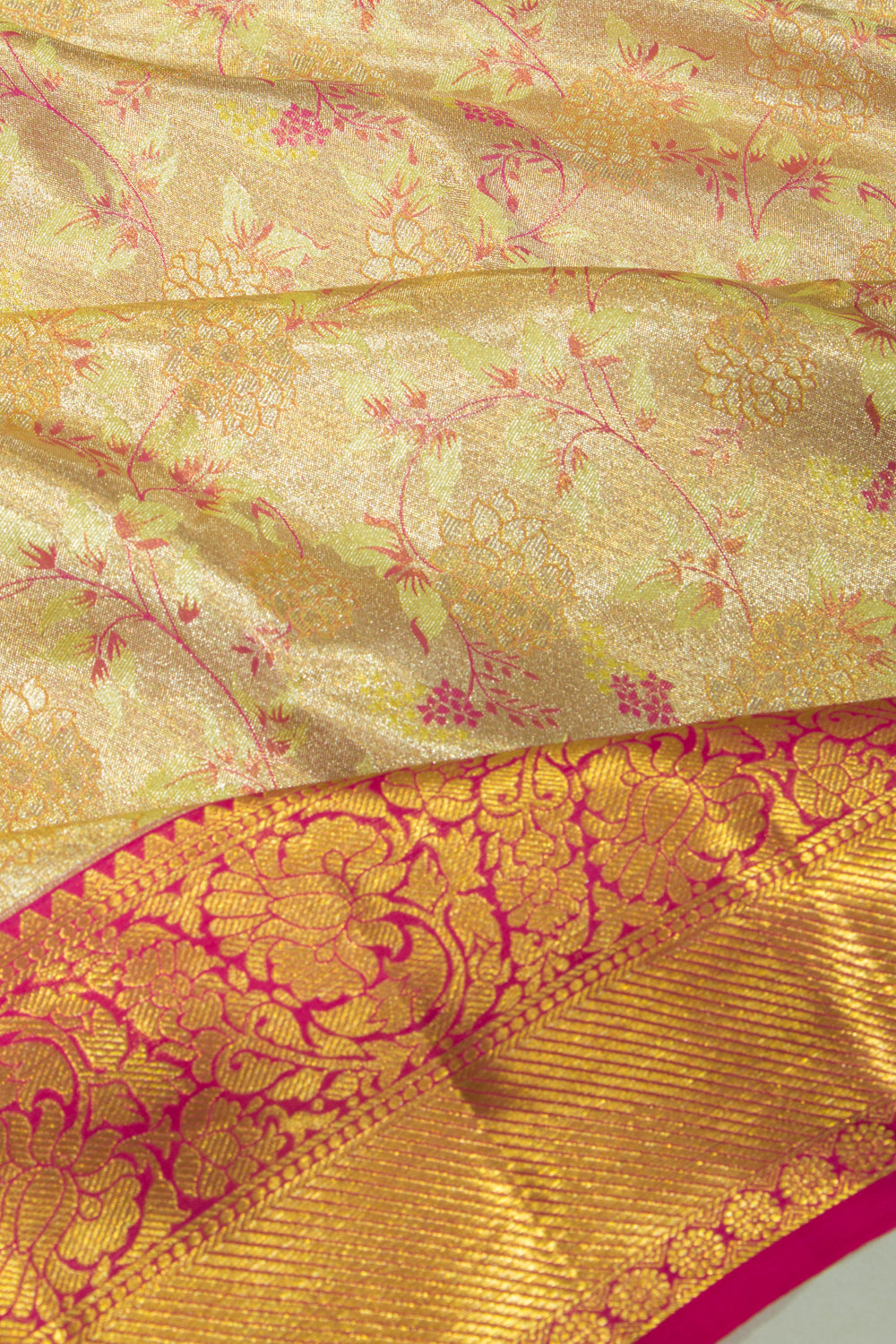 Taranga Kanchi Silk Tissue Brocade Gold Saree