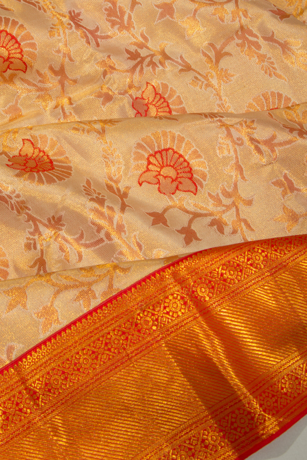 Taranga Kanchi Silk Tissue Jaal Gold Saree