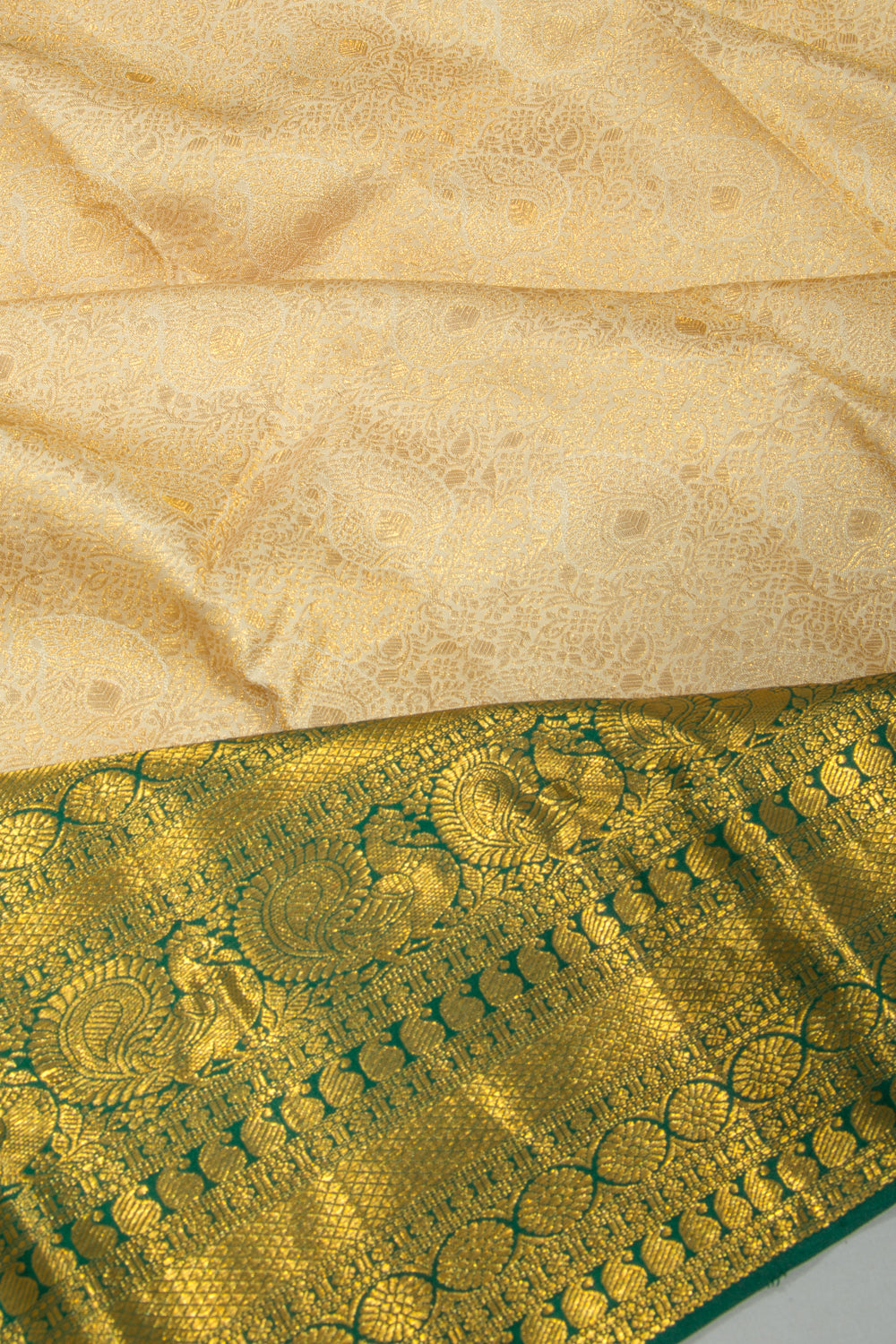 Taranga Kanchi Silk Brocade Cream Saree
