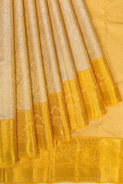 Taranga Kanchi Silk Tissue Brocade Gold Saree