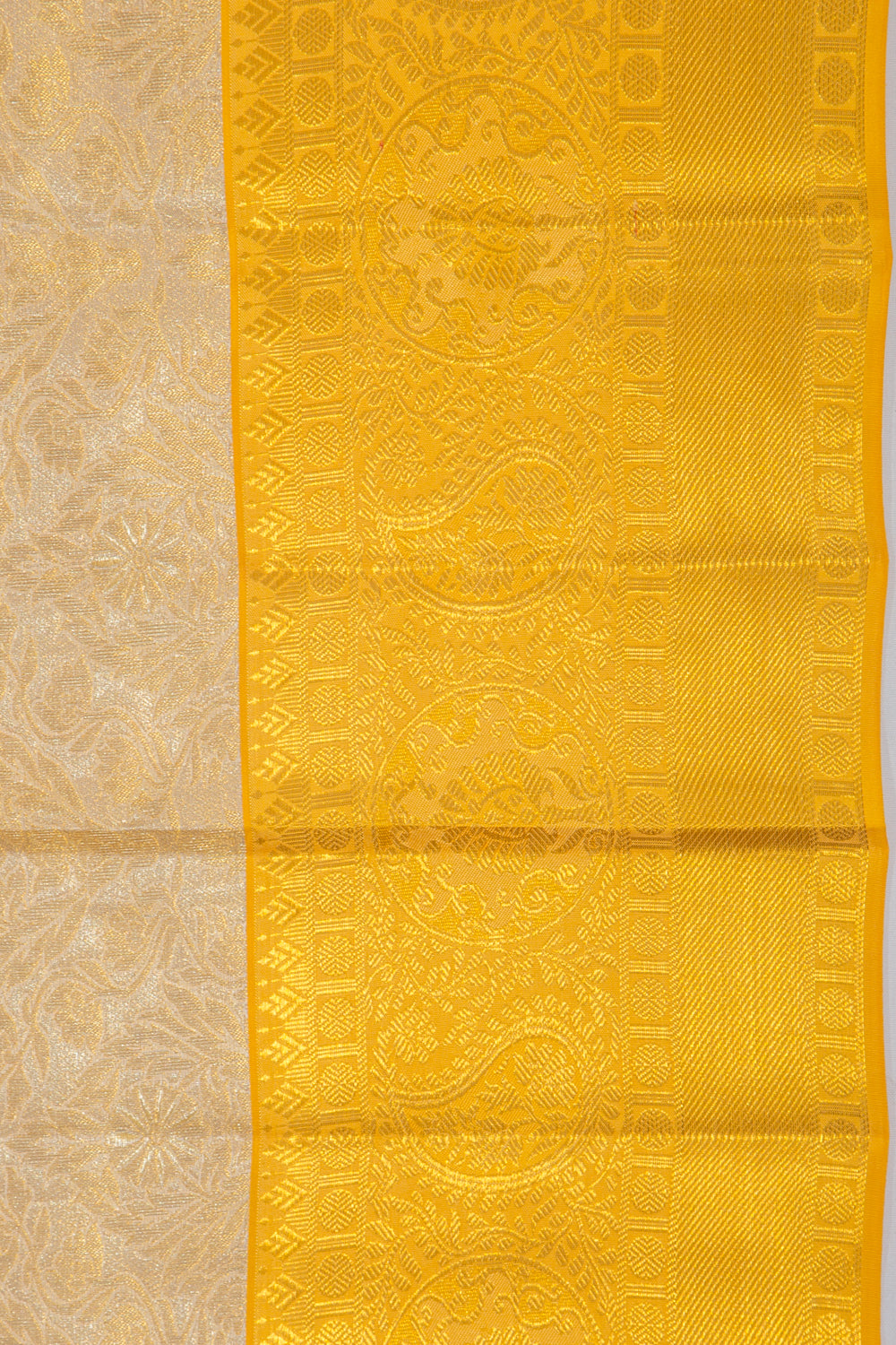 Taranga Kanchi Silk Tissue Brocade Gold Saree