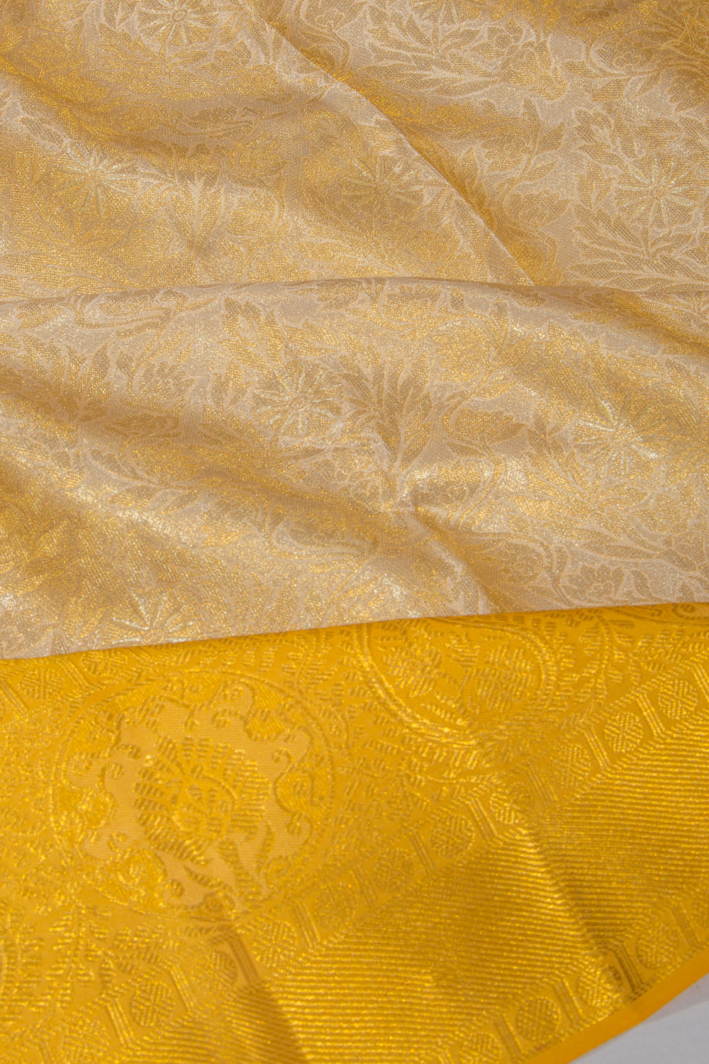 Taranga Kanchi Silk Tissue Brocade Gold Saree